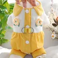 Detail view showing corduroy fabric texture and 3D crocheted flowers on yellow dog winter coat - XS / Yellow and White