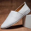 Classic white textured leather men's loafers featuring elegant hand-stitched sole detail - 38 / Loafers (955) / White
