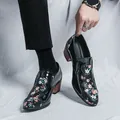 Men's stylish black patent leather dress shoes featuring floral patchwork and wooden heel. - 38 / Black