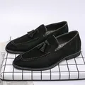 Elegant black suede men's loafers with classic tassel detail and pointed toe for business - 38 / Black