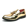 Men's glossy gold metallic loafers featuring tassel detail and a studded black sole - 38 / Gold