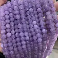 Macro view of purple lavender amethyst round loose beads with natural mineral texture - 6mm (Approx 62 Beads)/Strand / Lavender