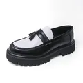 Mens stylish black and white platform loafers with tassel detail in polished leather finish - 38 / Black and White