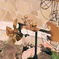 Detailed view of a handmade metal drummer windmill garden kinetic sculpture. - Metal Drummer Windmill Style (569823) / Gold