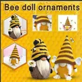 Cute bee themed gnome ornaments featuring crochet textures, striped hats and sunflower details - Knitted Bee Gnome Set / Set / Yellow and Black Striped