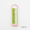 Detailed view of a green and white striped fabric keychain pendant with pink clasp - 12cm / Green White Striped (2)