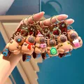 Diverse cartoon Capybara siliconen sleutelhangers met diverse schattige accessoires - Mixed Gen 5 Styles