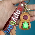 Schattige Capybara-sleutelhanger met bruine siliconen band en een kleine schildpad - Schildpad Stapelbare Capibara