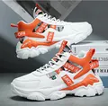 Trendy men's white and orange chunky sports sneakers with thick platform soles and laces. - 40 / High Top Thick Sole Sneakers / White-Orange