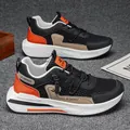 Atmungsaktive schwarz-orange Herren-Sneaker mit dicker Sohle und Mesh-Obermaterial - 40 / Schwarz & Orange