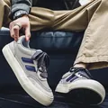 Nuevas zapatillas casuales de malla transpirable gris para hombre con rayas azules 2025 - 40 / Gris