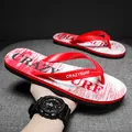 Sportliche rot-weiße rutschfeste Herren-Flip-Flops mit 'CRAZYSURF'-Aufdruck für Strand - 40 / Rot