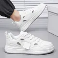 Trendy white men's low-top sneakers with breathable mesh details for casual wear - 40 / White