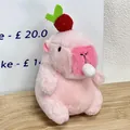 Cute pink Capybara plush toy keychain charm featuring small fruit decoration on head - Bubble Blowing Apple Style / Pink