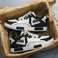 Stylish black and white casual leather sneakers for men shown in creative packaging - 39 / Black and White