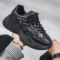 Sneakers chunky da uomo nere con suola spessa a piattaforma e tomaia in pelle testurizzata - 40 / Nero
