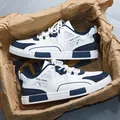 Classic white and navy leather sneakers for men with GUO CHAO side detail - 39 / White Blue