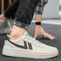 Stylish beige casual sneakers with brown accents and durable rubber sole for men. - 38 / Beige Brown
