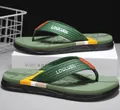 Infradito verdi da uomo con cinturini in tessuto e suole antiscivolo in gomma per mare - 40 / Moda / Verde militare