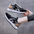 Trendy herensneakers in zwart en grijs met dikke zool en luxe modieuze belettering - 36 / Zwart