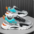 Scarpe da corsa da uomo in mesh traspirante con vivaci accenti blu e arancioni - 36 / Grigio nero