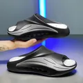 Modern black and grey sporty slides for men with soft non-slip sole for outdoor beach use - 40/41 / Black and Gray