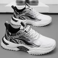Moderne sneakers chunky bianche e nere con mesh traspirante e suole spesse - 40 / Scarpe Sportive con Cuscino d'Aria di Tendenza (205W39NY) / bianco e nero