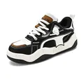 Retro breathable platform bread sneakers in black and white contrast for streetwear - 39 / Black and White