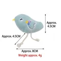 Soft plush teal bird cat toy with rope legs, size dimensions approx 8cm x 4.5cm - Bird