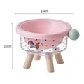 Elevated pink ceramic pet bowl with wooden legs and clear base showing 16cm diameter - Single Bowl / Pink