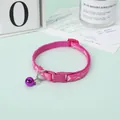 Detailed view of pink paw print pet collar with a purple bell and secure buckle for cats - 1.0cm Width 19-32cm Adjustable / Rose Red