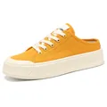Fashionable yellow canvas mule sneakers featuring a thick textured sole and white laces. - 34 / Orange