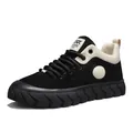 Vintage style men's black and white low-top sneaker with chunky textured sole. - 39 / Black