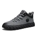 Men's stylish grey leather low-top sneakers with thick black wavy sole and retro design - 39 / Gray