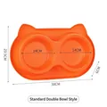 Orange cartoon cat shaped anti-ant double pet bowl, standard model with size markings. - Anti-Ant Standard Double Bowl Style / Plastic Double Bowls / Orange