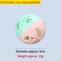 Two-color pink and green plastic cat toy ball with internal bell and paw cutouts - Pink and Green Bell Ball