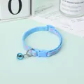 Adjustable light blue pet collar featuring pink paw prints and a blue metal bell - 1.0cm Width 19-32cm Adjustable / Sky Blue