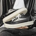 Baskets en cuir high-street pour hommes noir et blanc avec semelles ondulées. - 35 / Noir