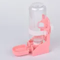 Pink pet water dispenser with a transparent bottle and cage mounting knob for small animals - Pink