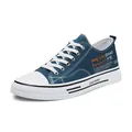 Stylish blue low-top canvas sneakers for men featuring white laces and rubber sole - 40 / Blue