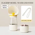 Portable 2-in-1 dog water bottle and food dispenser with a convenient wrist strap. - Water & Food Cup / White