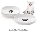 Weiße Keramik-Katzenschale mit schwarzem Pfotenmuster, 15 cm Durchmesser - Pfotenabdruckmuster / Einzelstück