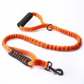 Heavy-duty orange bungee dog leash with dual handles and reflective stitching - Orange