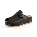 Close-up detail of black peep-toe platform sandals with brass rivets and buckle strap - 38 / Black