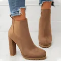 Stylish women's chunky high heel Chelsea boots with round toe and lugged platform sole - US11 / Brown