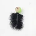 Scary Halloween cat toy featuring a green bloodshot eyeball and soft black feather - No. 8 Eyeball Feather Toy