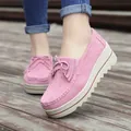 Elegant pink suede platform loafers with fringe and bow detail on thick white sole - 35 / Pink