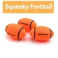 Set mit drei orangefarbenen, quietschenden Rugbybällen für Hunde zur Zahnpflege und Spiel - Quietschender Rugbyball / Zufällige Farbe