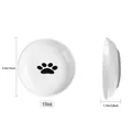 Professional white ceramic cat plate with black paw print design and non-slip silicone base - 15cm/10oz Paw Print (Gray Silicone Base)