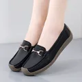 Comfortable black leather loafers for women with soft soles and elegant gold buckle accents - 35 / Black